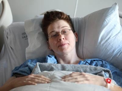 discovery life dread disease cover woman in hospital bed