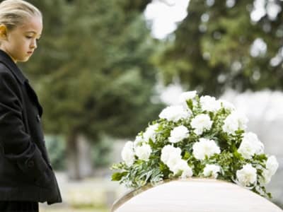 young girl at funeral