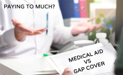 gap cover costs vs medical aid doctor with patient hands paperwork