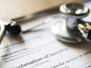 medical aid scheme company comparisons stethoscope on paperwork