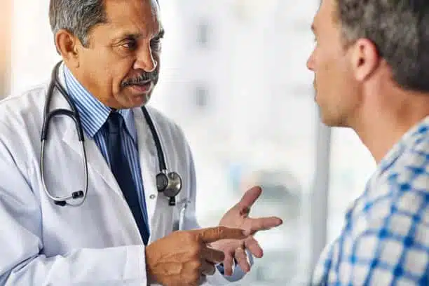 informed healthcare solutions mens health november 2019 newsletter doctor talking to man