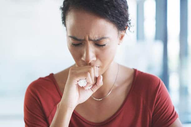 World TB Day 2021 a woman coughing