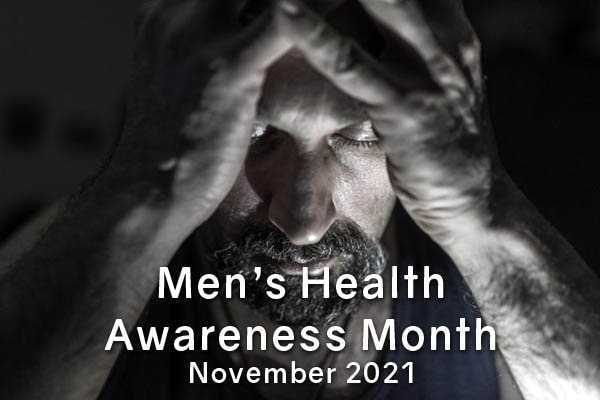 Men's Health Month November 2021 man with head in hands