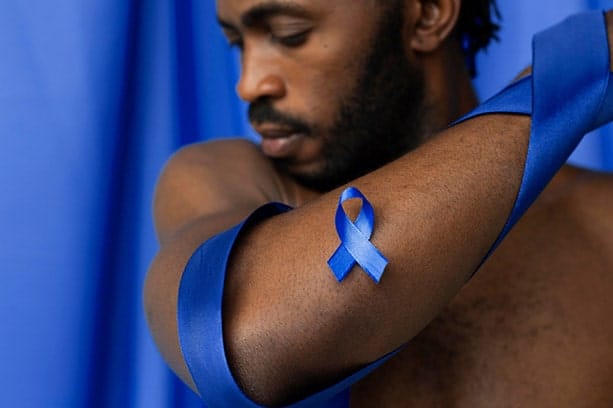 informed healthcare solutions movember 2023 november newsletter prostate cancer awareness ribbon on mans arm