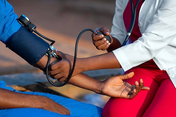 informed healthcare solutions world heart day 2023 29 september a person getting their blood pressure taken