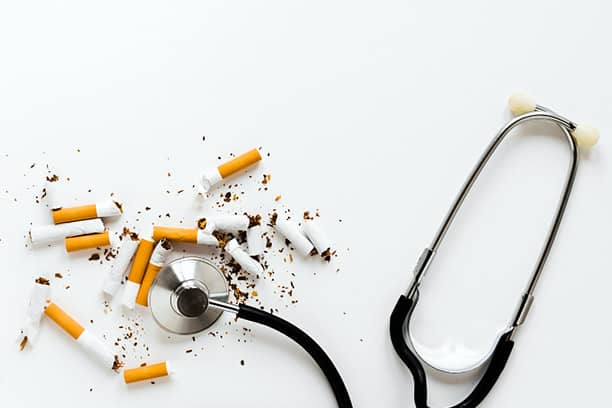 informed healthcare solutions world heart day 2023 29 september a stethoscope surrounded by cigarette butts