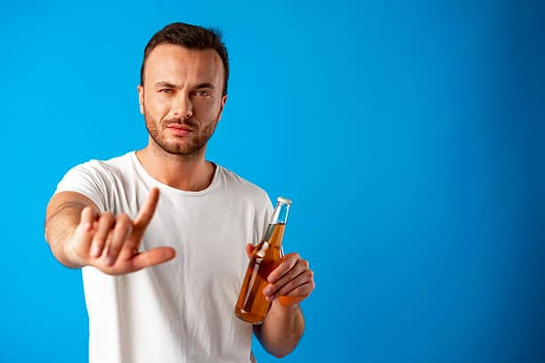 informed healthcare solutions man pointing out not to drink alcohol