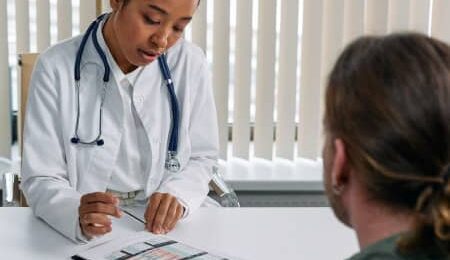 discovery gp network plan woman doctor with patient